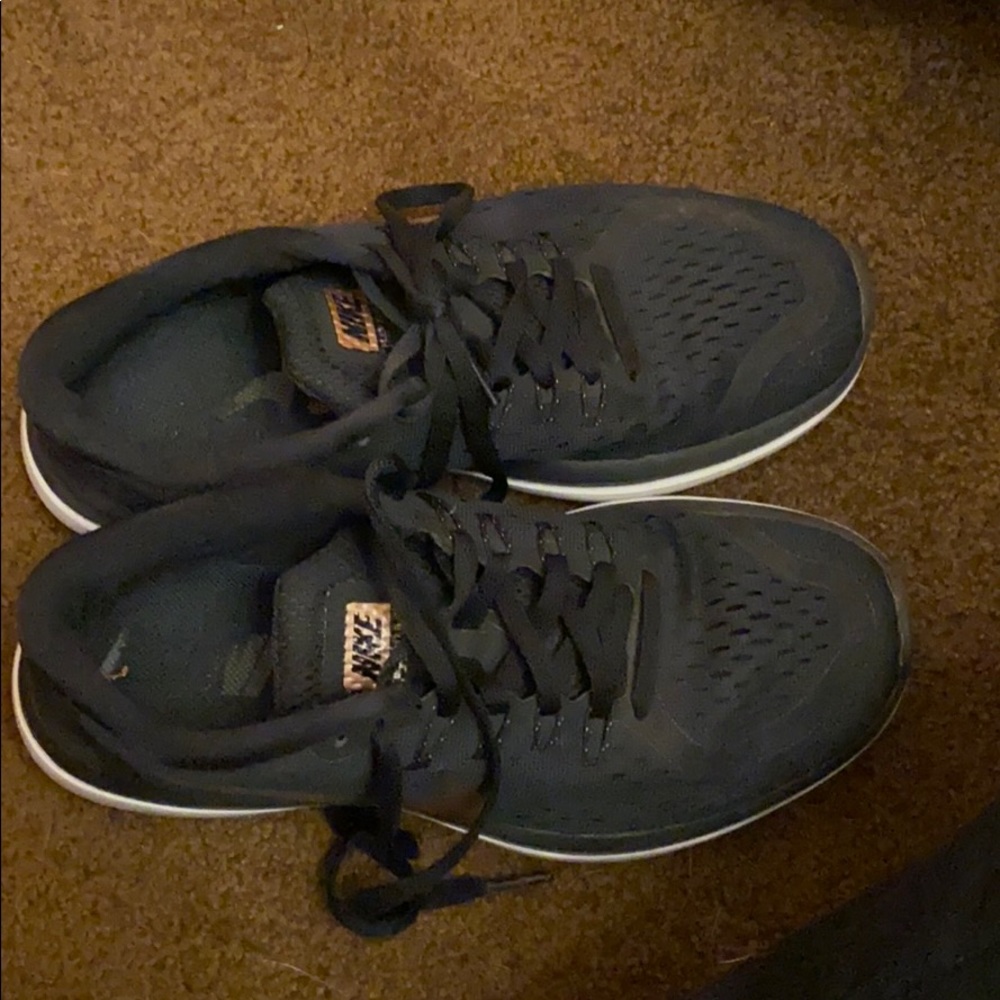 Black and rose gold women’s size 7 Nike shoes